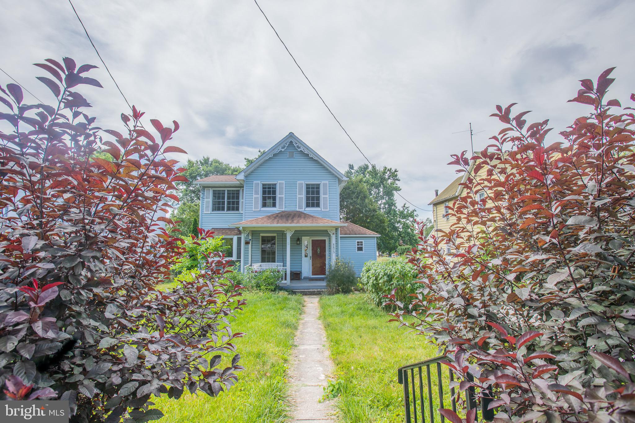 8875 Baltimore Street Savage, MD 20763 - Photo 2 of 32 a view of a house with swimming pool next to a yard
