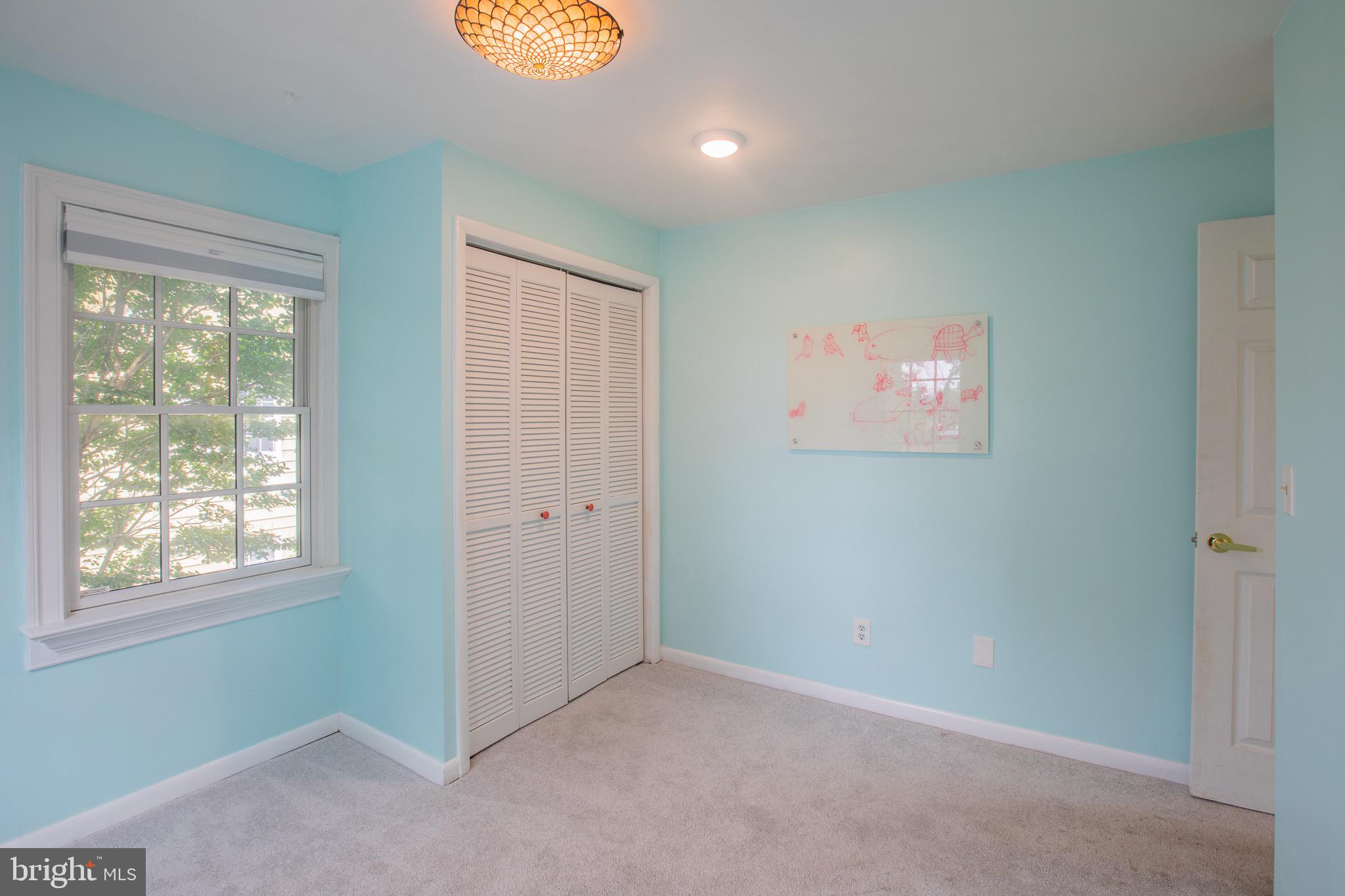 8875 Baltimore Street Savage, MD 20763 - Photo 22 of 32 a view of an empty room with a window