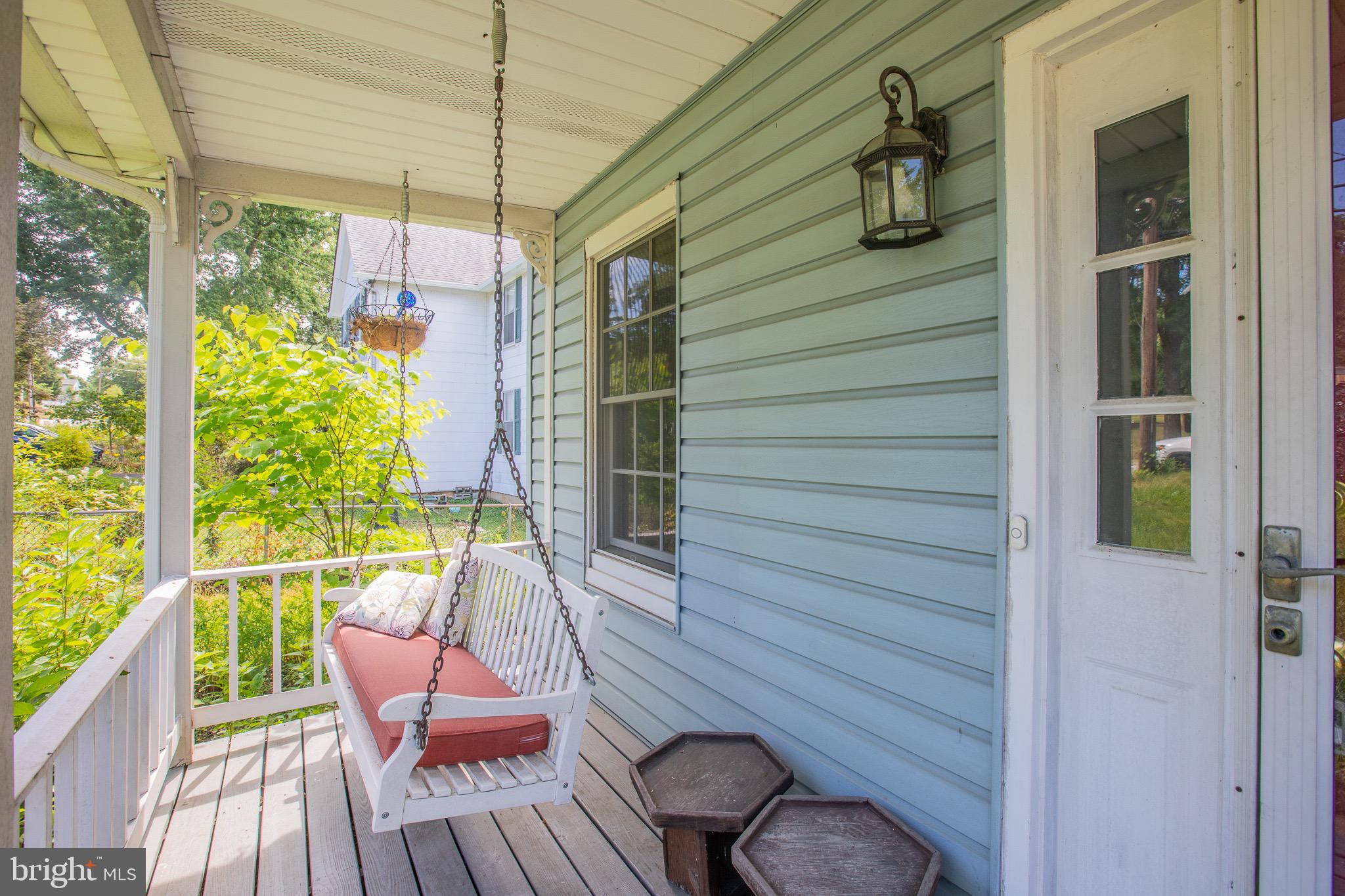 8875 Baltimore Street Savage, MD 20763 - Photo 23 of 32 a view of a balcony with chairs