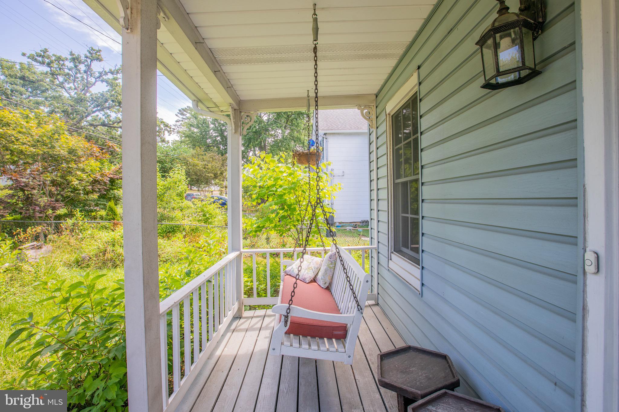 8875 Baltimore Street Savage, MD 20763 - Photo 24 of 32 a view of balcony with wooden floor