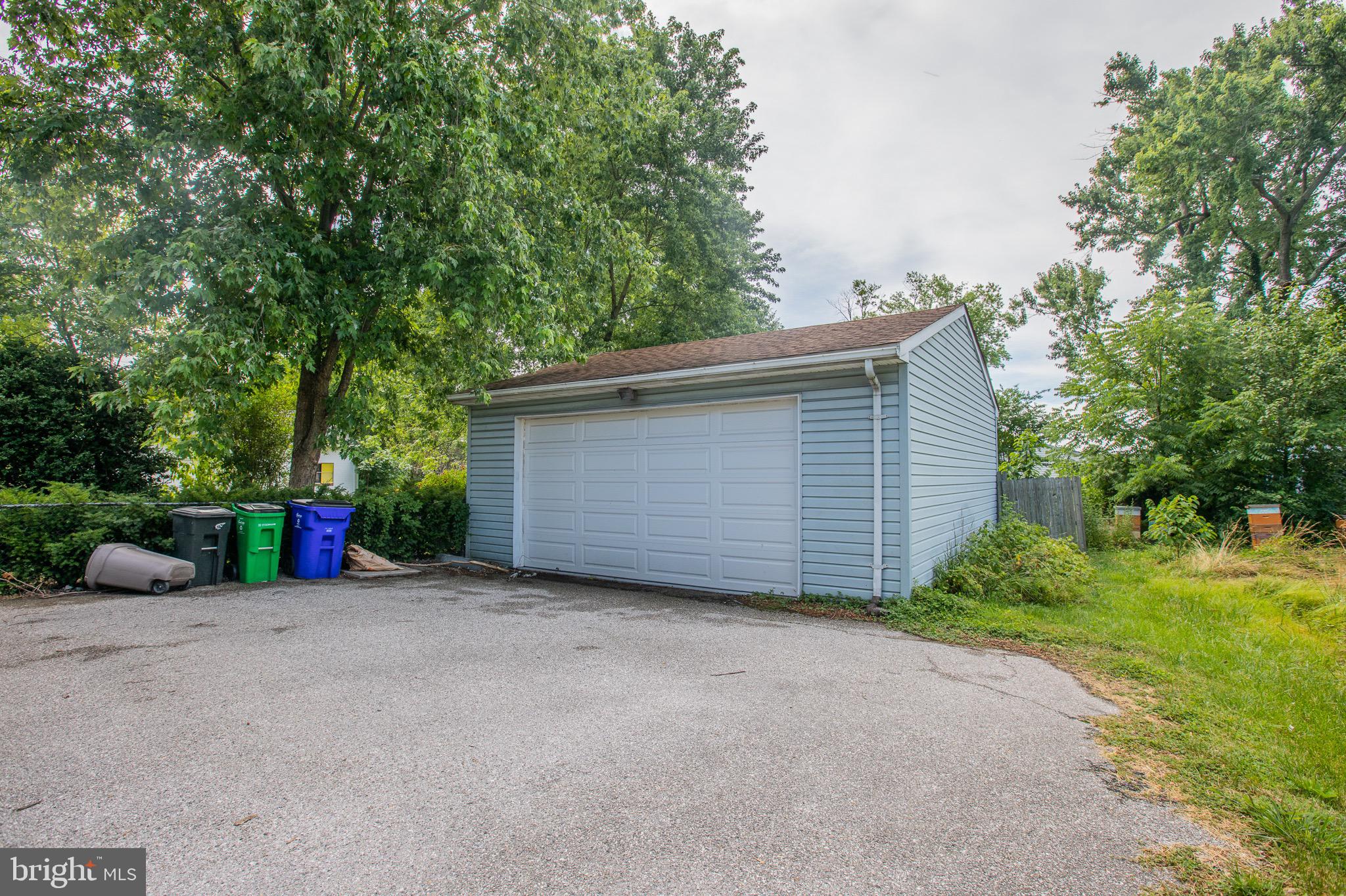 8875 Baltimore Street Savage, MD 20763 - Photo 25 of 32 a view of a house with wooden fence