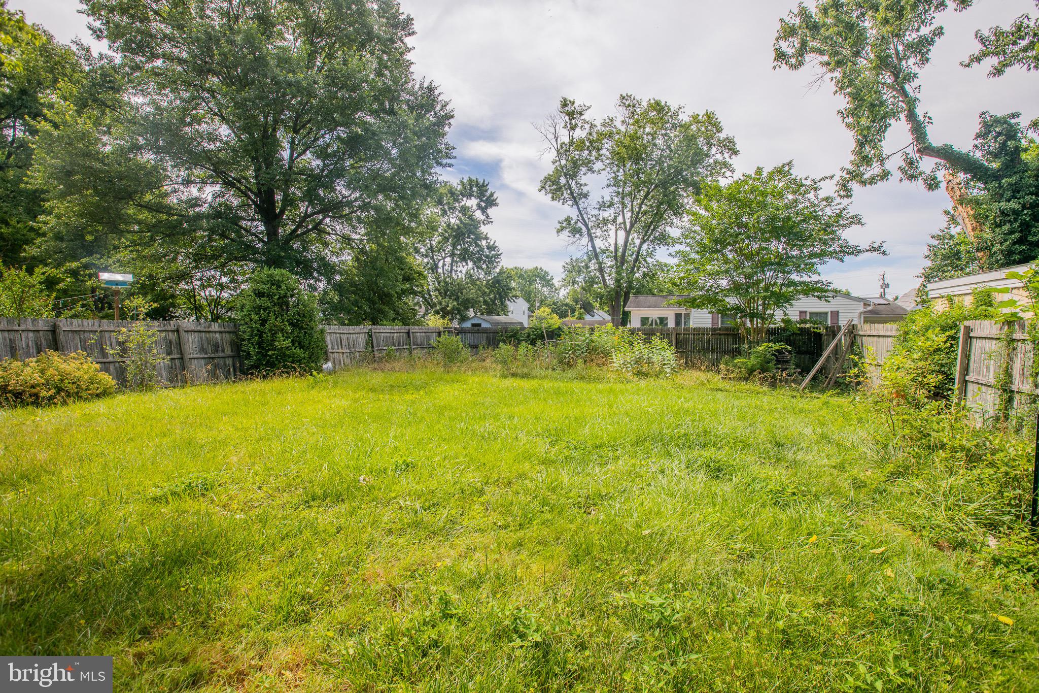 8875 Baltimore Street Savage, MD 20763 - Photo 28 of 32 a view of yard with swimming pool and green space