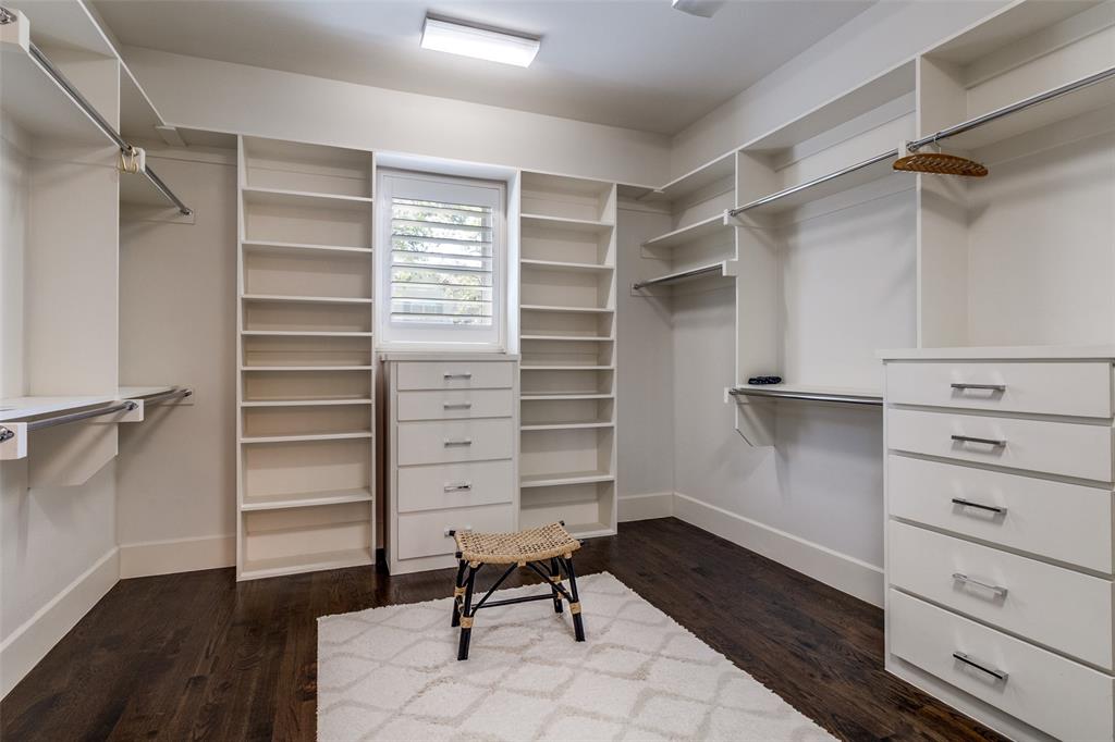 6615 Northwood Road Dallas, TX 75225 - Photo 18 of 30 a view of walk in closet with empty racks