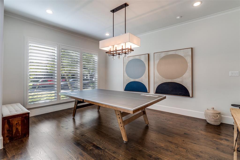 6615 Northwood Road Dallas, TX 75225 - Photo 2 of 30 a room with table chairs and wooden floor