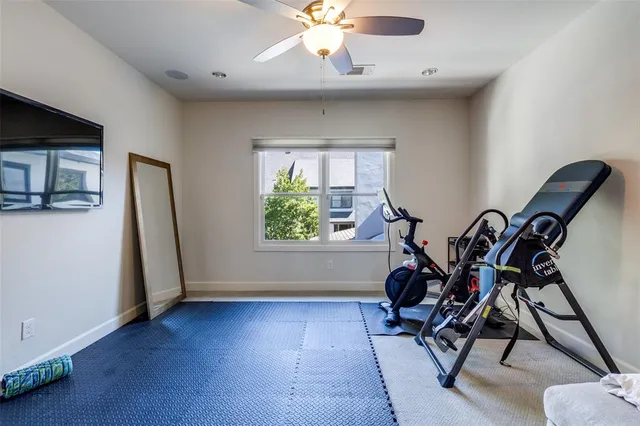 a view of a livingroom with furniture and a window