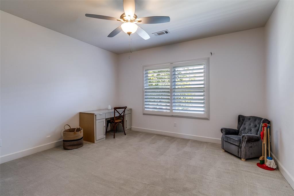 6615 Northwood Road Dallas, TX 75225 - Photo 24 of 30 a living room with furniture and a window