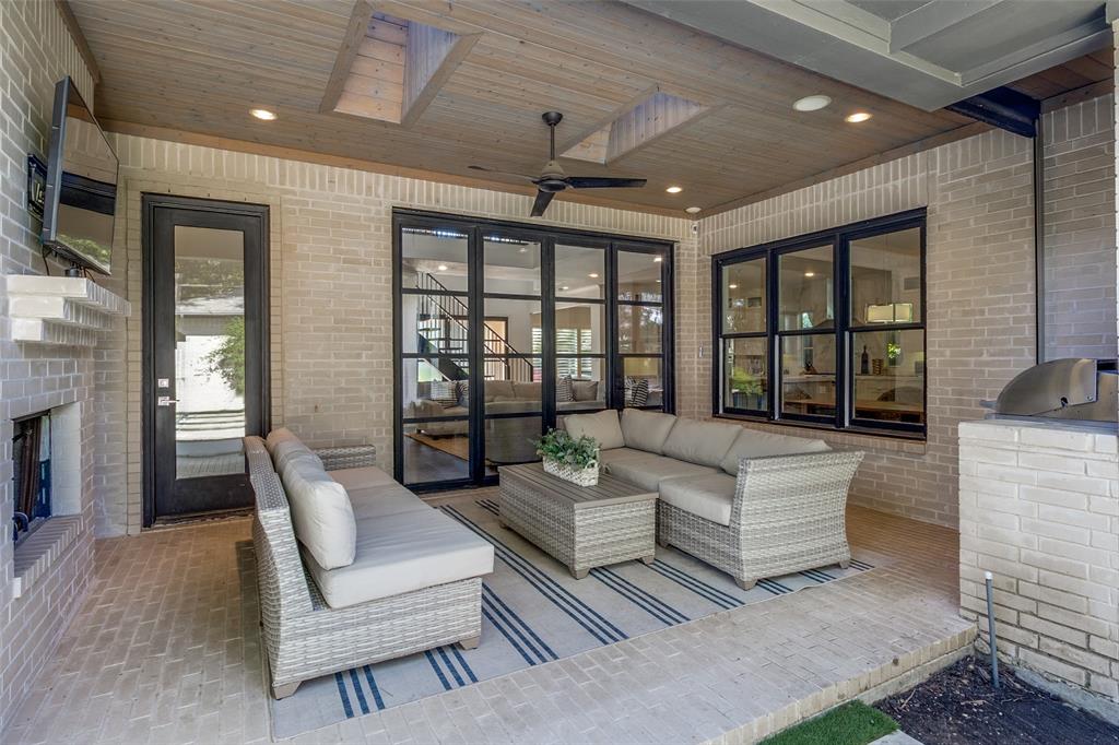 6615 Northwood Road Dallas, TX 75225 - Photo 26 of 30 a living room with furniture and a large window