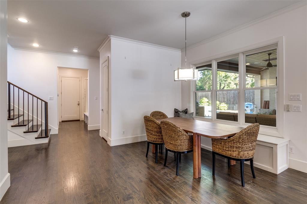 6615 Northwood Road Dallas, TX 75225 - Photo 9 of 30 a view of a dining room with furniture window and wooden floor