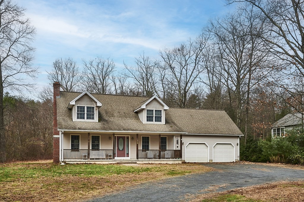 75 Pomeroy Meadow Road Southampton, MA 01073 - Photo 1 of 36 front view of a house with a yard