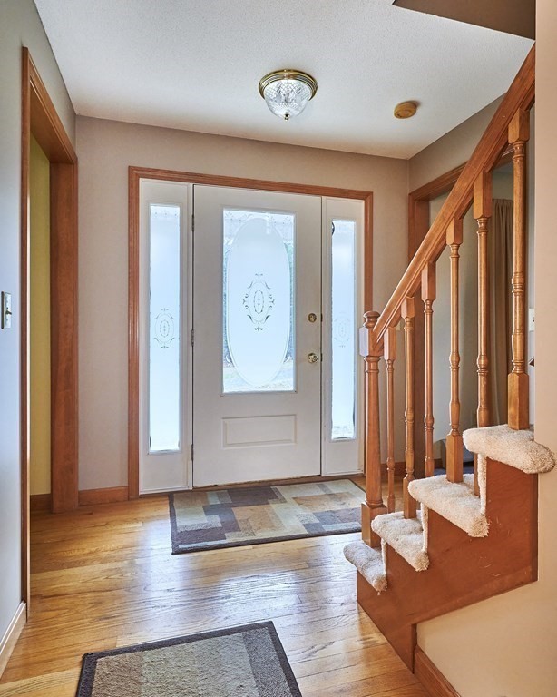 75 Pomeroy Meadow Road Southampton, MA 01073 - Photo 16 of 36 a view of an entryway with wooden floor and door