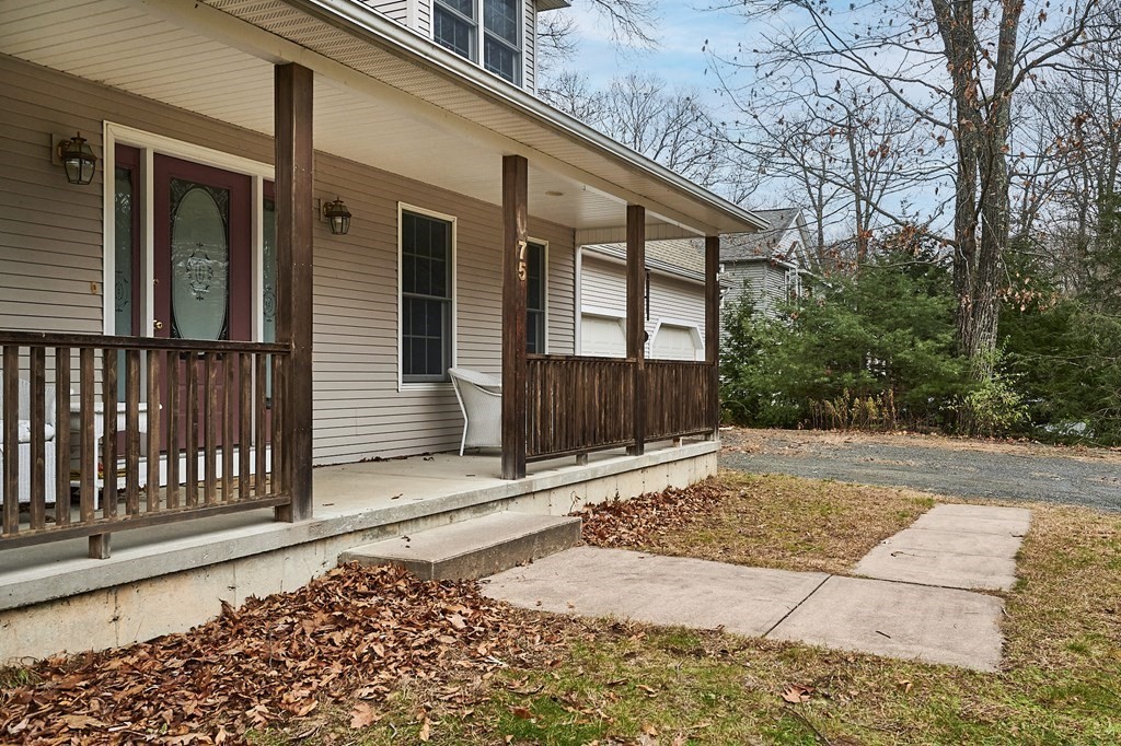 75 Pomeroy Meadow Road Southampton, MA 01073 - Photo 3 of 36 a view of a house with a street