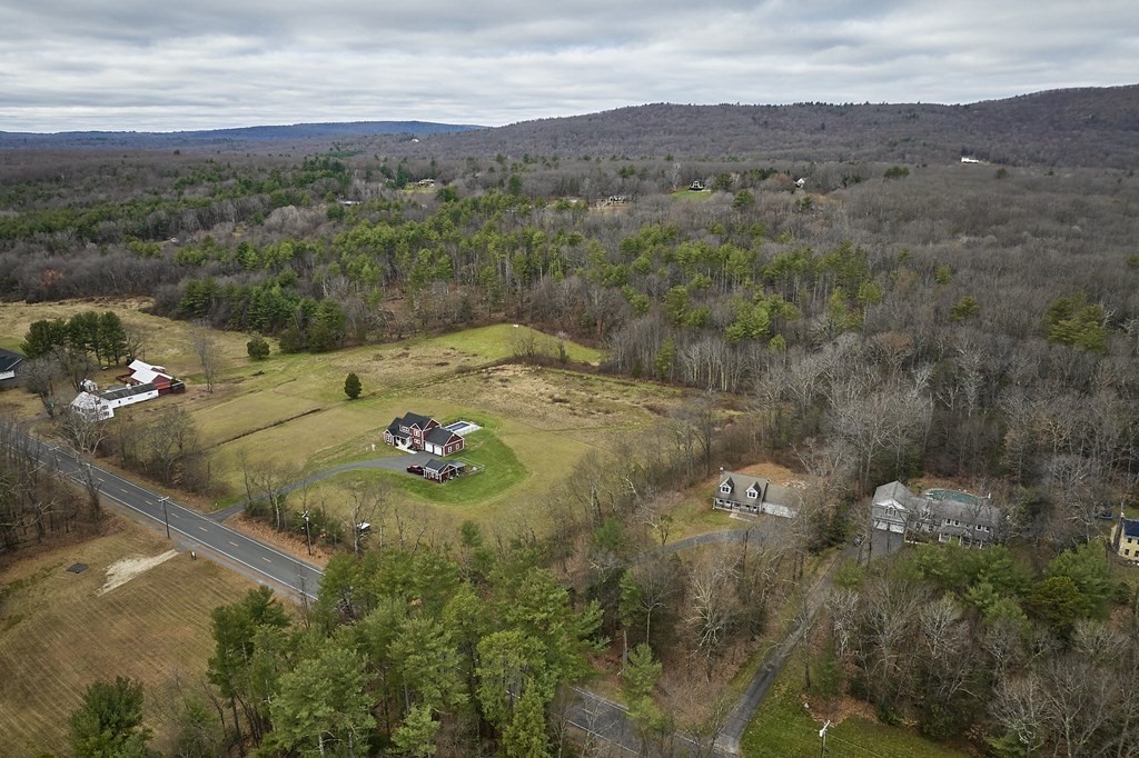75 Pomeroy Meadow Road Southampton, MA 01073 - Photo 36 of 36 an aerial view of a house with a yard