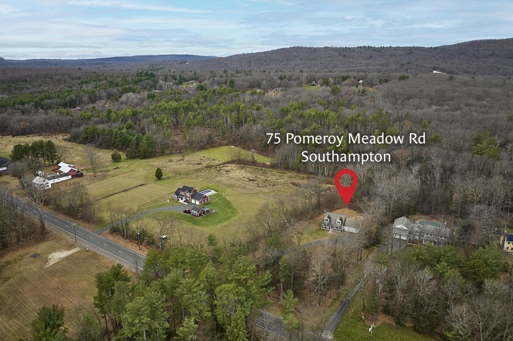 75 Pomeroy Meadow Road Southampton, MA 01073 - Photo 6 of 36 an aerial view of a house with a garden