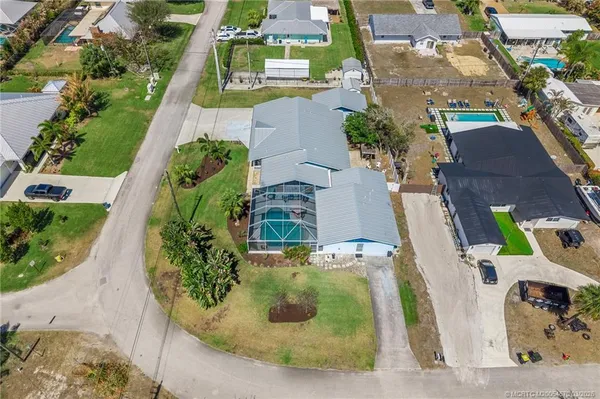 an aerial view of a house with outdoor space