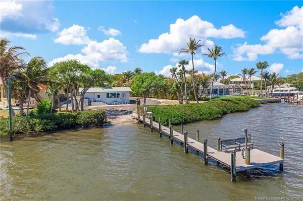 a view of a lake in front of house