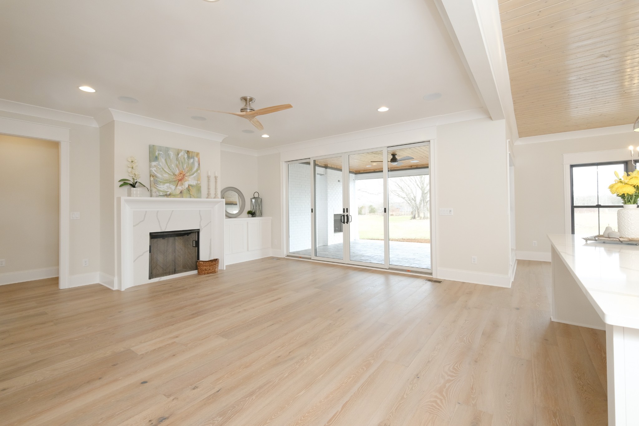 5740 Browns Mill Road Lascassas, TN 37085 - Photo 3 of 44 a view of an empty room with a fireplace and a window