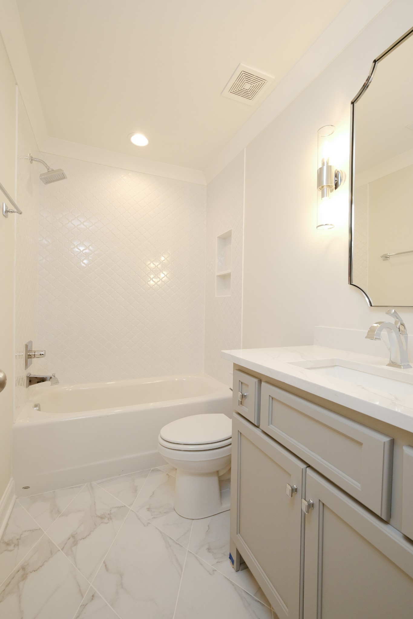 5740 Browns Mill Road Lascassas, TN 37085 - Photo 38 of 44 a bathroom with a sink a toilet and a bathtub