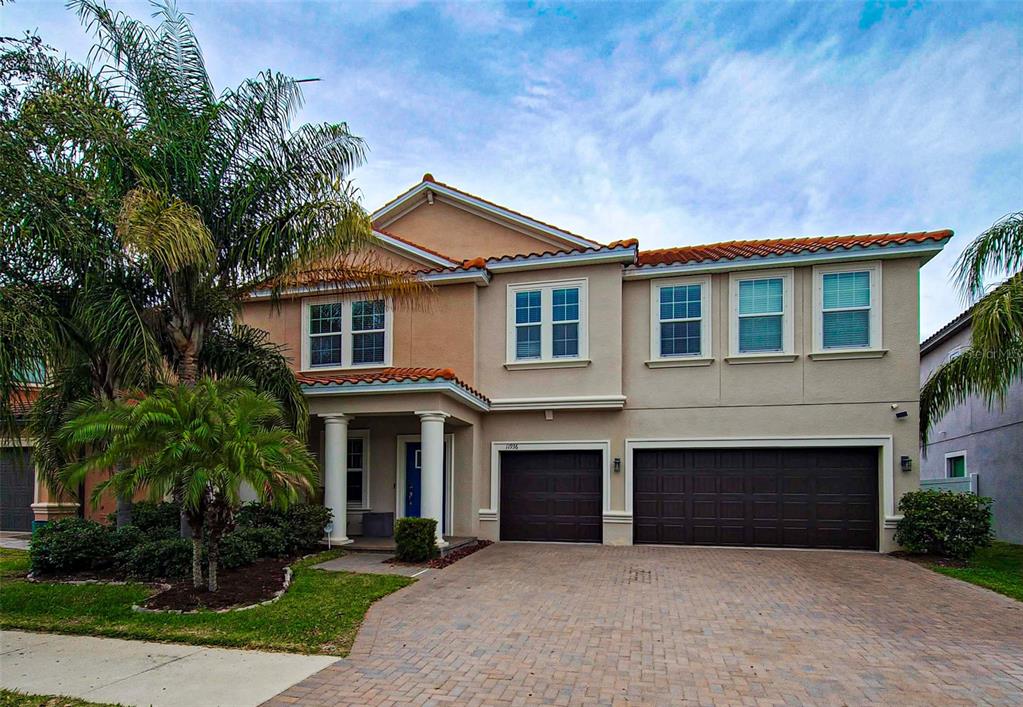 11936 Sand Myrtle Road Riverview, FL 33579 - Photo 1 of 1 a front view of a house with yard and tress