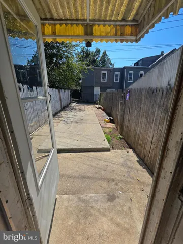a view of balcony with wooden floor