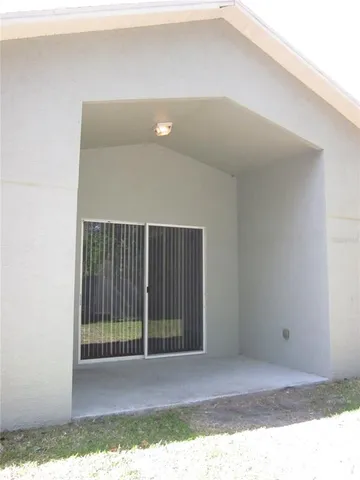 a view of backyard and porch