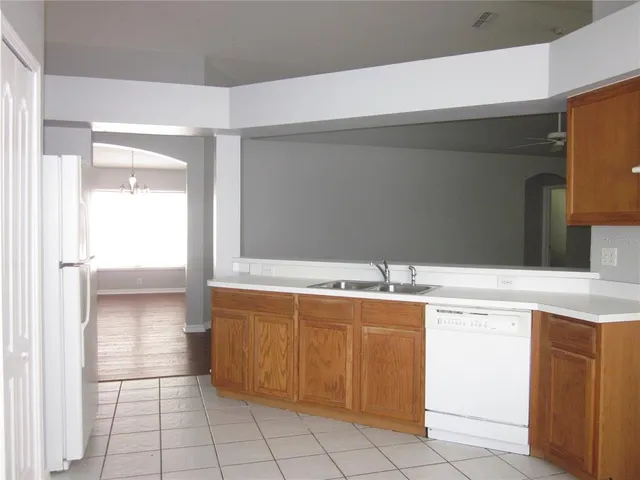 a kitchen with a cabinets and a sink