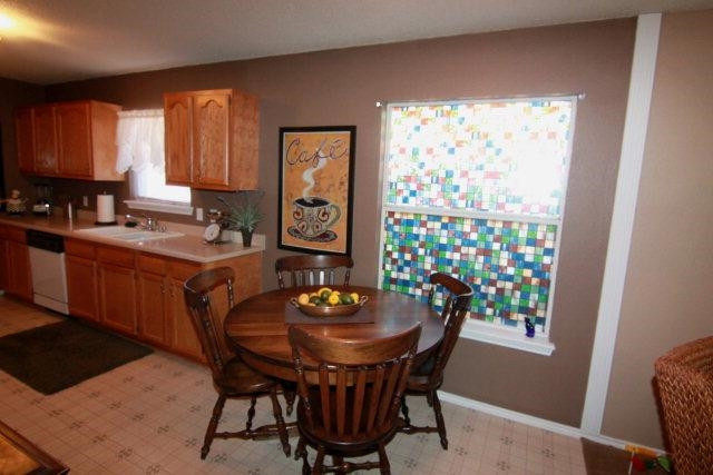 2525 110th Street Lubbock, TX 79423 - Photo 7 of 10 a view of a dining room with furniture and window