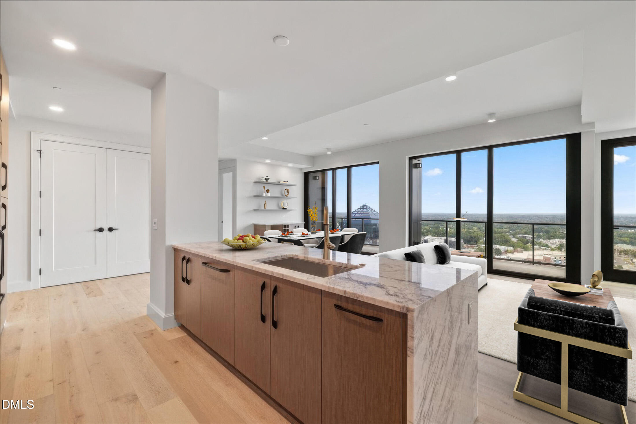 a kitchen with sink and large window