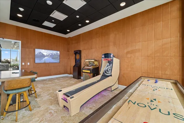 a kitchen with stove and cabinets