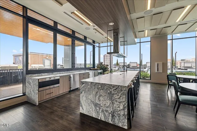a large white room with mirror and window