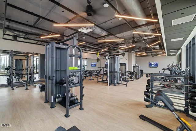 a swimming pool with outdoor seating and yard