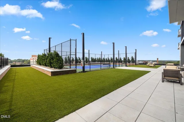 a swimming pool with chairs