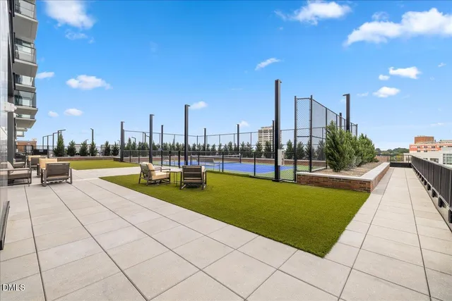 a view of a swimming pool with a lounge chairs