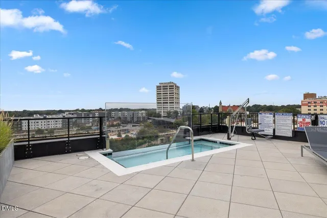 a view of a building with a swimming pool