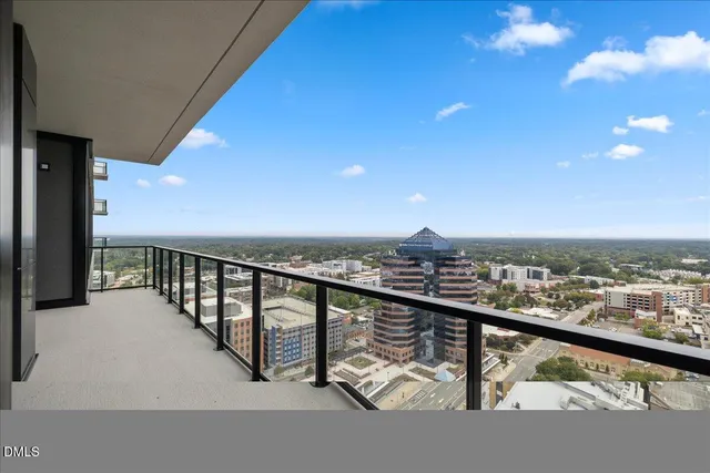 a view of city from a balcony