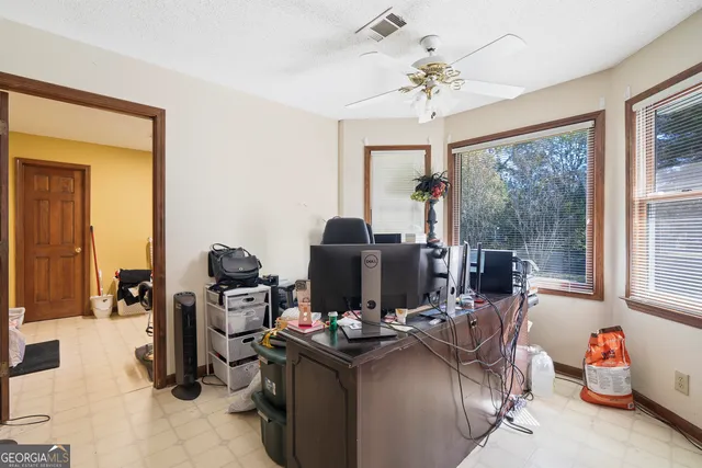a view of a kitchen with car parked