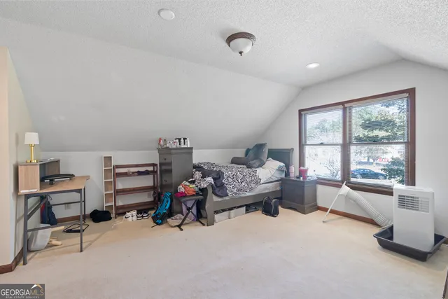 a view of backyard and hardwood