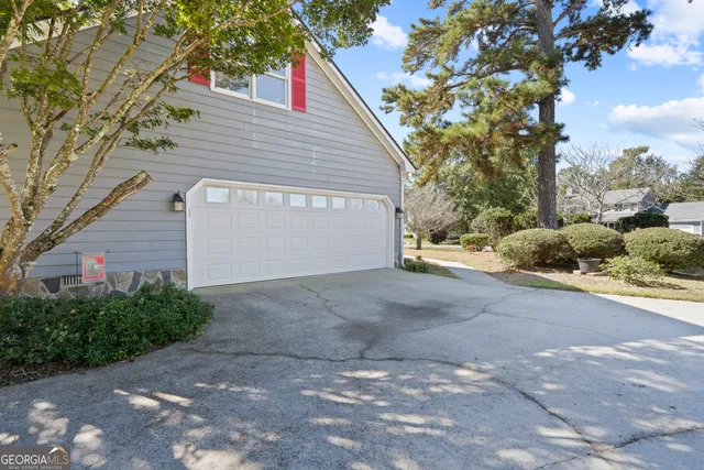 a house view with a garden space
