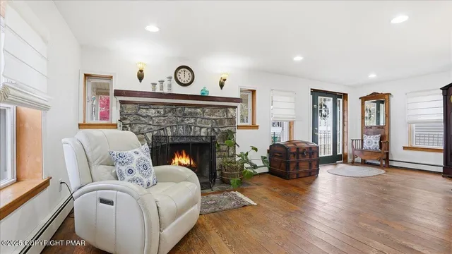 a kitchen with stainless steel appliances a stove a sink and a refrigerator