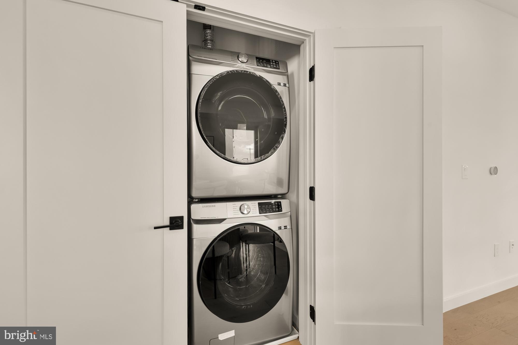 30 Kennedy Street Northwest, Unit 6 Washington, DC 20011 - Photo 26 of 35 a utility room with dryer and washer