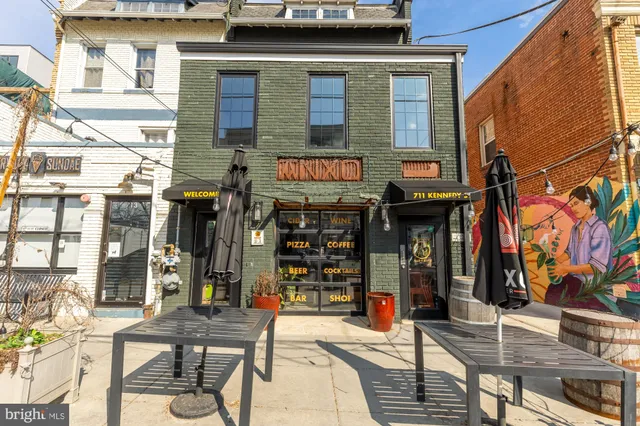 a view of a building with a street