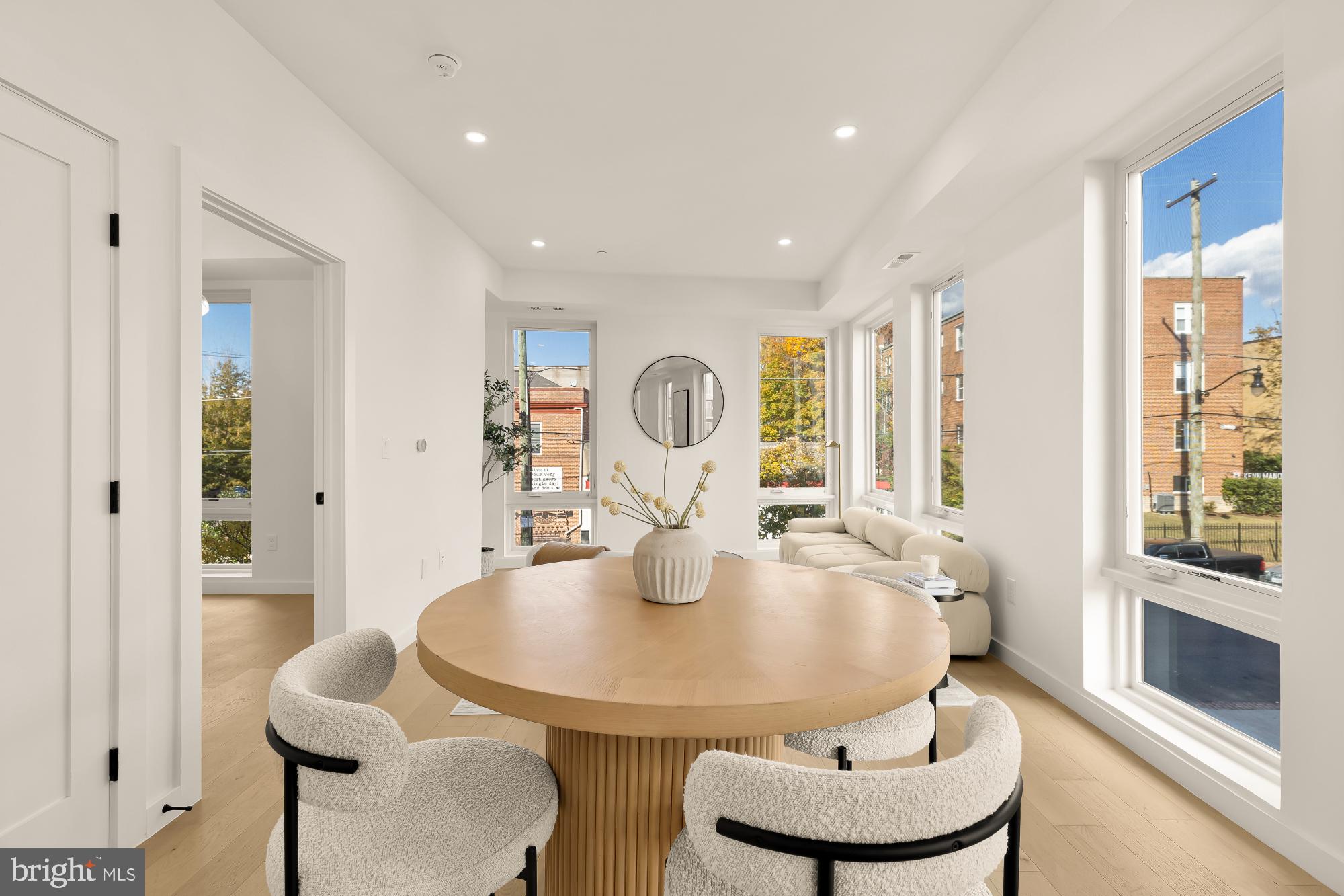 30 Kennedy Street Northwest, Unit 6 Washington, DC 20011 - Photo 7 of 35 a dining room with furniture and a chandelier