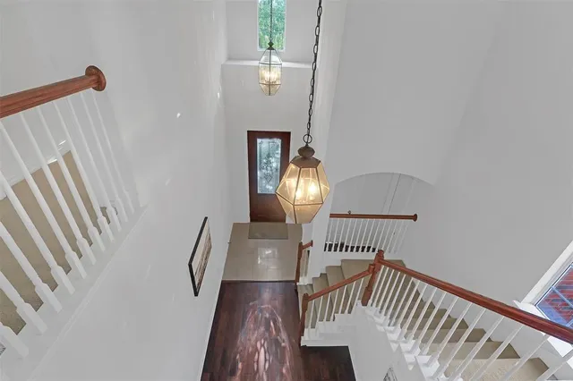 a view of a balcony with wooden floor