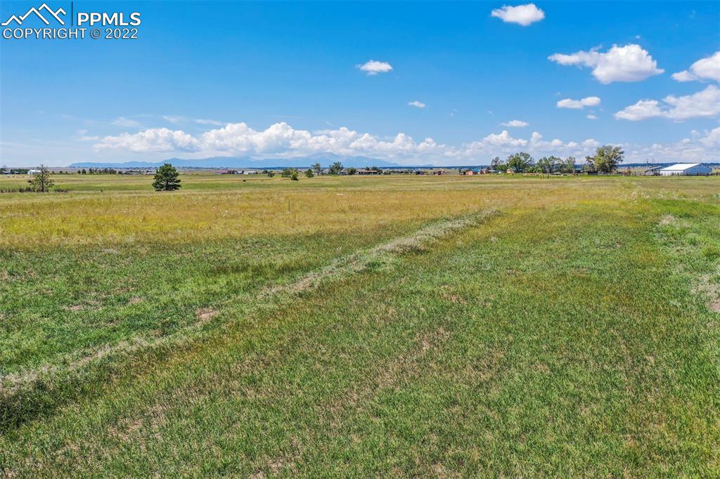 14775 Tiboria Loop Peyton, CO 80831 - Photo 17 of 20 a view of an ocean and a building