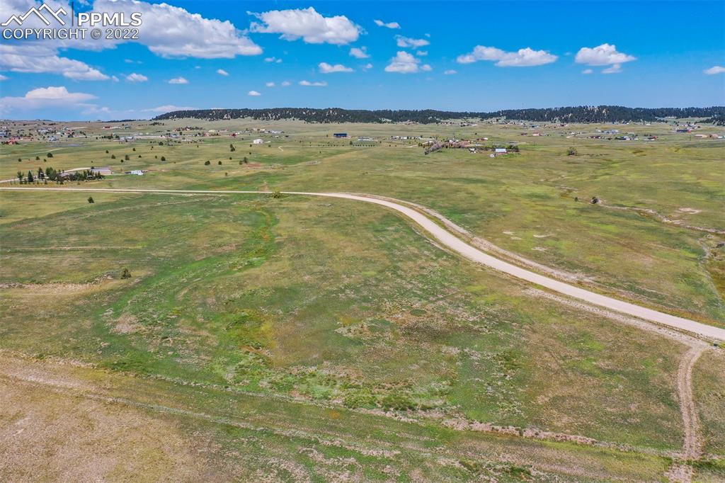 14775 Tiboria Loop Peyton, CO 80831 - Photo 6 of 20 a view of an ocean and beach