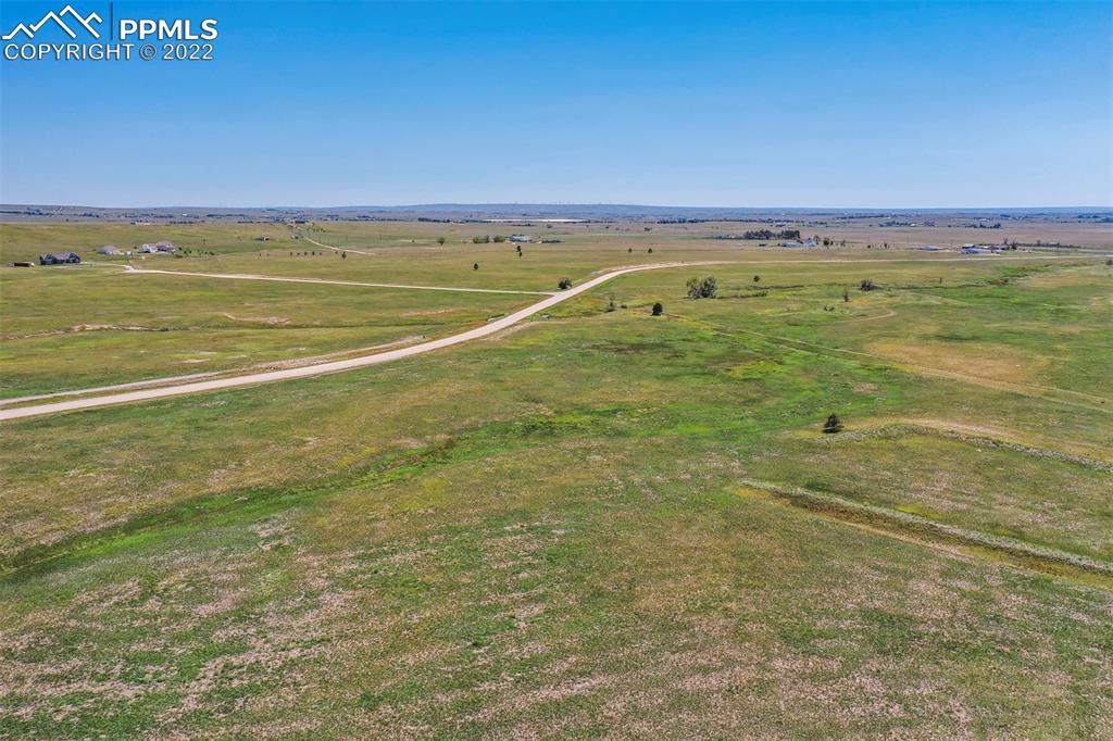 14775 Tiboria Loop Peyton, CO 80831 - Photo 8 of 20 a view of an ocean and beach