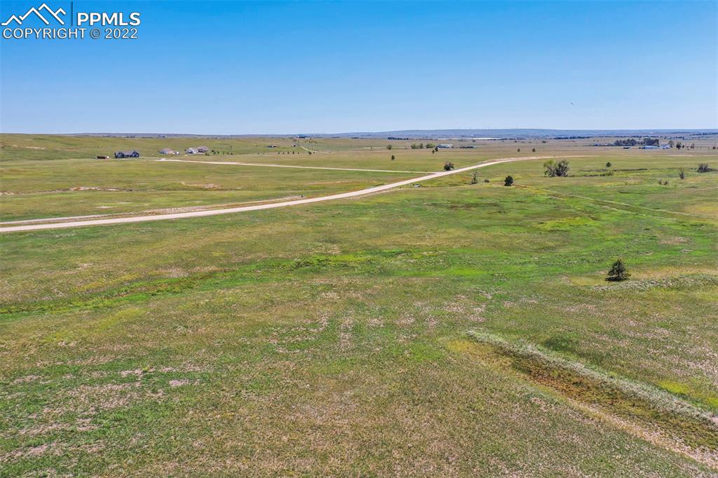 14775 Tiboria Loop Peyton, CO 80831 - Photo 9 of 20 a view of an ocean and beach