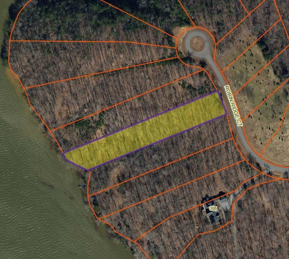 Lot 6 Robin Ridge Court Pittsville, VA 24139 - Photo 13 of 14 a view of a backyard with wooden fence