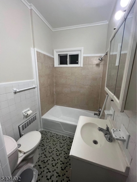 234 Christine Street, Unit 2F Elizabeth, NJ 07202 - Photo 7 of 11 a bathroom with a sink toilet and shower