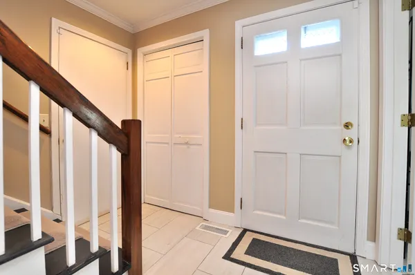 a view of front door with hallway