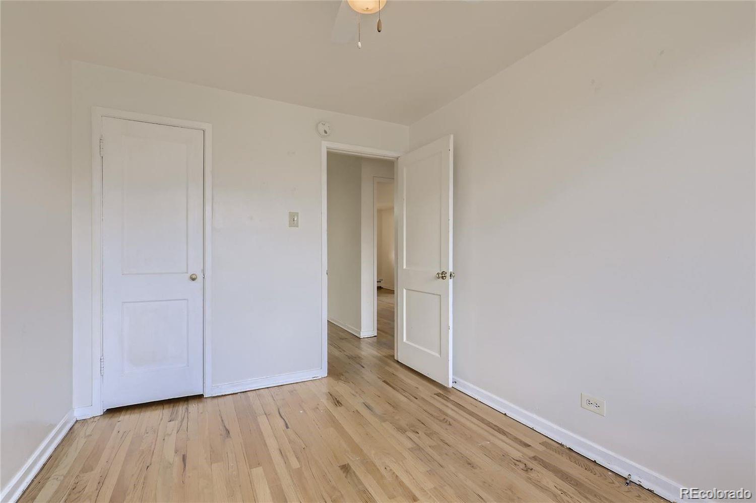 411 Quebec Street Denver, CO 80220 - Photo 20 of 31 a view of an empty room with wooden floor